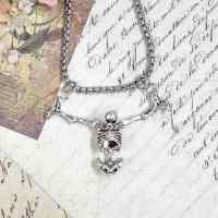 Кулон Костик