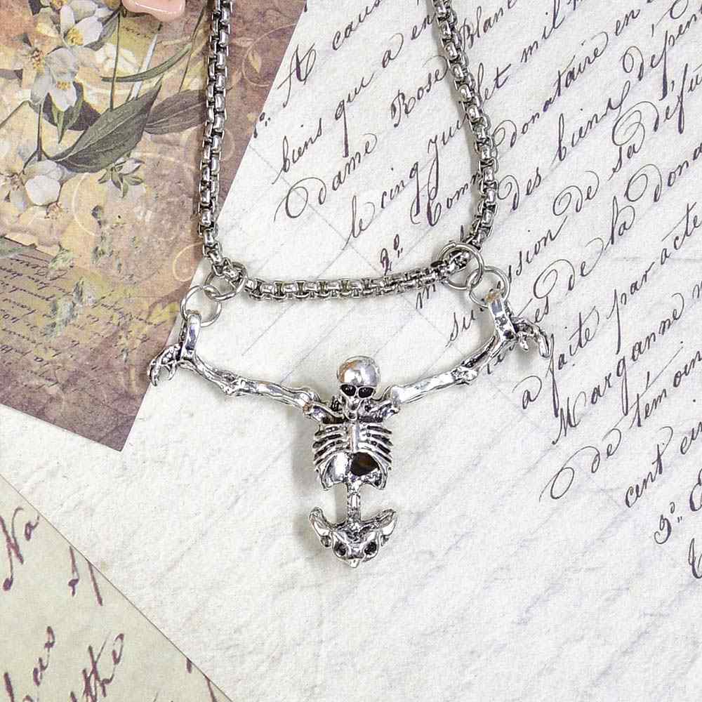 Кулон Костик